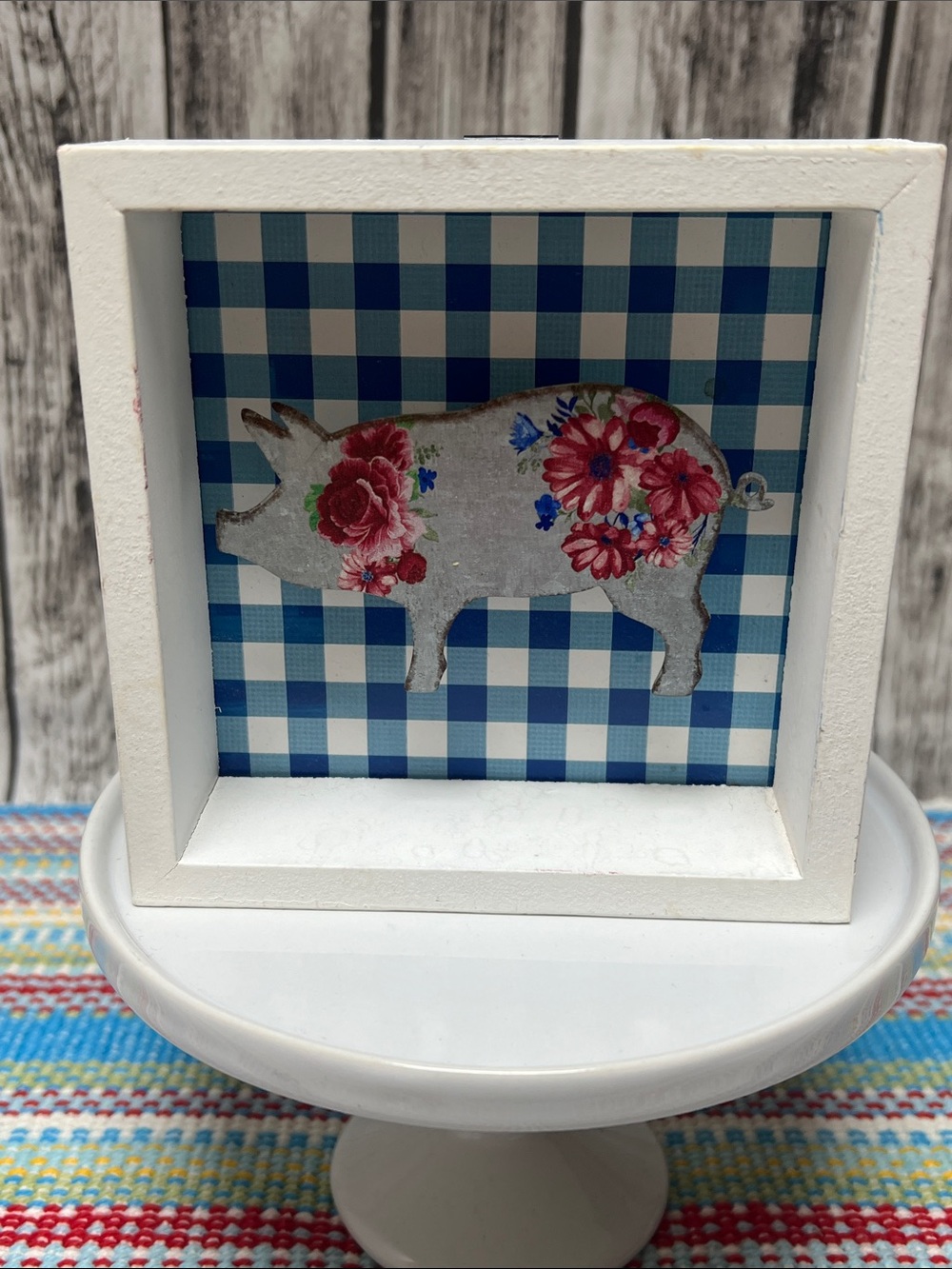 The Pioneer Woman Pig silhouette shadow box with blue gingham background